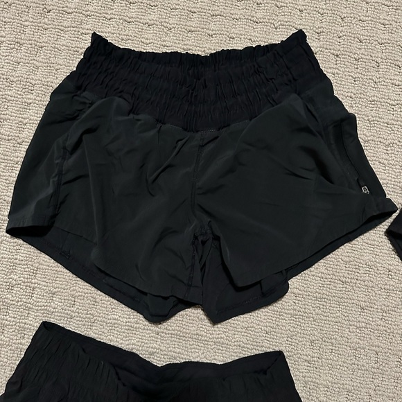 4 pairs of Lululemon shorts. Excellent used condition. - Picture 5 of 5